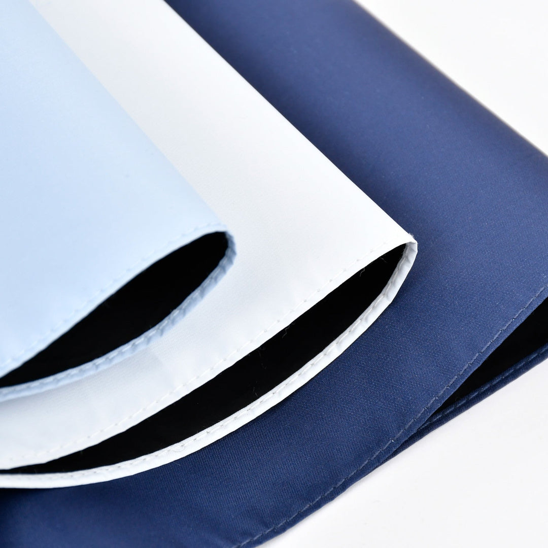 その日傘、まだ「厚み」で選んでいますか？——生地の薄さが証明する、真の遮熱性能。